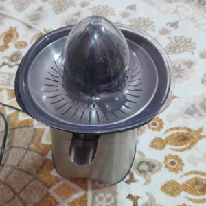 عصارة برتقال متعدده الاستعمال