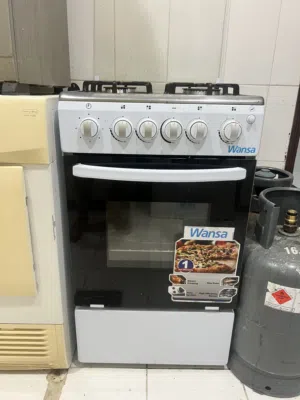 طباخ غاز 4 عيون و غسالة ملابس