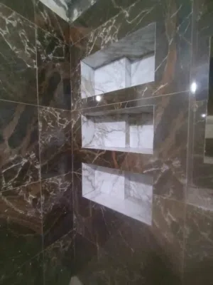 علي القريشي للأعمال السيراميك والارضيات والمقاولات العامة ترميم أعمال الماء والمجاري