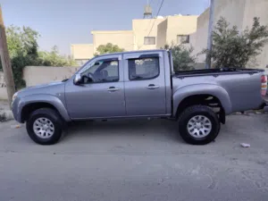 بكب مازدا BT-50 تيربو 4*4 موديل  2008   لون أسمنتي بحالة ممتازة