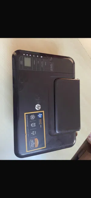 طابعه  اتش بي مع شاحنها