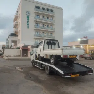 ساحبة لنقل السيارات من الزاوية الي جميع مدن ليبيا ومن تونس الي جميع مدن ليبيا
