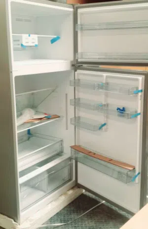 New unused full size sharp fridge for sale contact on whatsapp