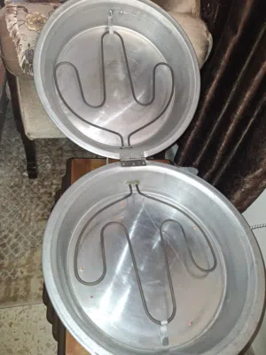 طنجرة شوي وخبيز كهربائية