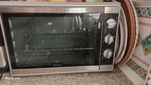 فرن كهرباءي -brand  ايطالي -Ariete-  يعمل علي الكهرباء - به شواية للدجاج - مؤقت - يصلح لعمل البيتزا