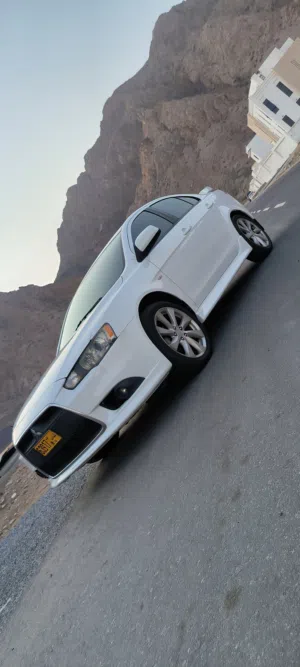 ميتسوبيشي لانسر 2014 GT أبيض مع كامل المواصفات الخليجية