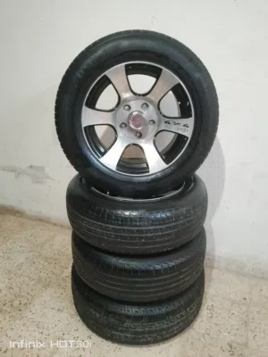 جنط اكسل 6 فراشات اصلي قياس 15 مع كوشوك نص عمر 150 دينار