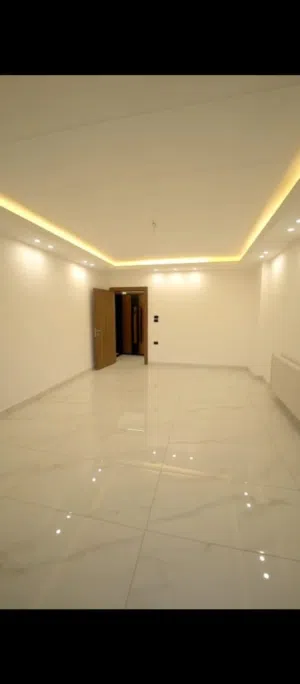 REF:14967 - شقة أرضية للبيع – طريق المطار  تشطيبات سوبر ديلوكس