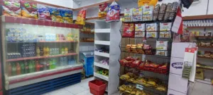 محل بقالة بموقع مميز البيع لحاجة تكملة بناء