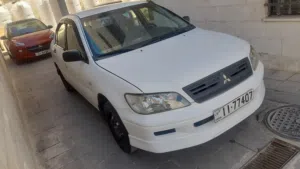 لانسر اوتوماتيك موديل 2003 للبيع