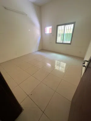 Family semi/furnished two rooms apartment a hall two bathrooms and a kitchen ground floor Riffa.