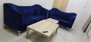 Velvet Blue Sofa For Sale in Good condition - Urgent sell. Expat leaving Bahrain
