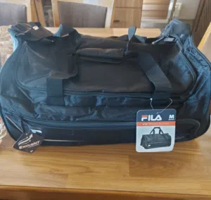 شنتة handbag تستخدم للجيم او للسفر جديدة ماركة FILA صنع CAMBODIA