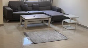 Stylish Living Room Furniture Set – Excellent Condition L-shaped dark grey sofa coffee table