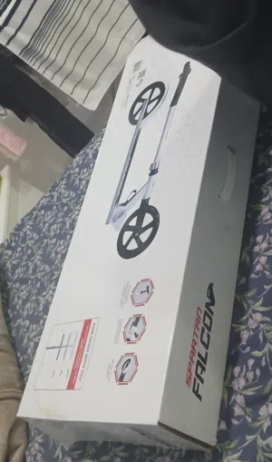 spartan falcon folding scooty almost new with box
