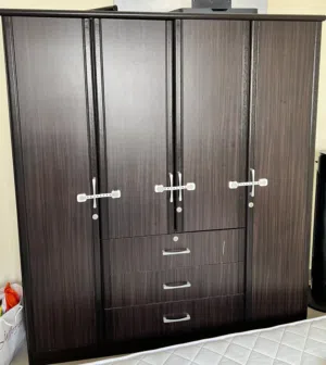 Spacious 4-Door Wooden Wardrobe with 3 Drawers – Excellent Condition!