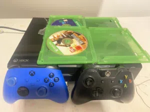 Classic Xbox One with Two Controllers and 2 Games – (Starting Price is 599 SAR -Price is Negotiable)