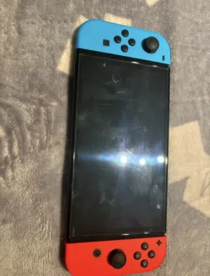 Nintendo switch OLED with 3 games **PRICE NEGOTIABLE**