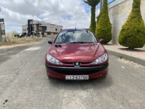 بيجو 206/2006 اتوماتيك محرك 1400cc بحالة ممتازه مرخصه سنة والفحص مرفق مع الصور