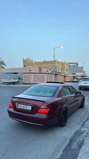 مرسيدس W211