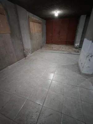 بدروم كبير للايجار 6 أكتوبر حي4 على مساحة العمارة بمنزل سيارة و مزود بنور و نظام صرف مياة من المالك