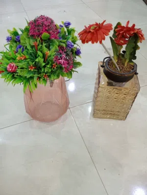 new home center glass pot with free flowers weighing around 1 to 1.5  kg each