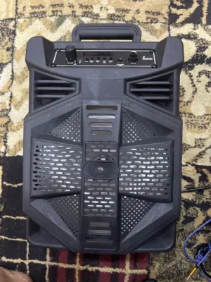 مكبر صوت بلوتوث وتستطيع تركيب مايكروفون لمجالس القرآن