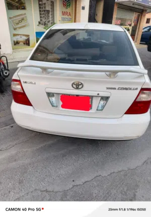 Corolla white colour model 2006