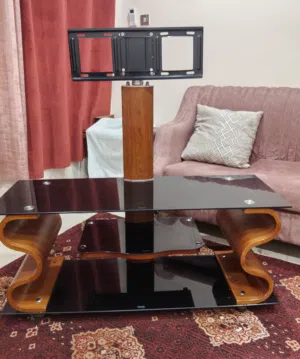 اثاث جديد سبب البيع السفر كنب مع تليفيزيون مع طربيزه تليفيزيون جديدة مع سجادتين تركي جديد
