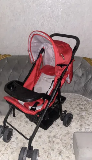 عربة أطفال جديده