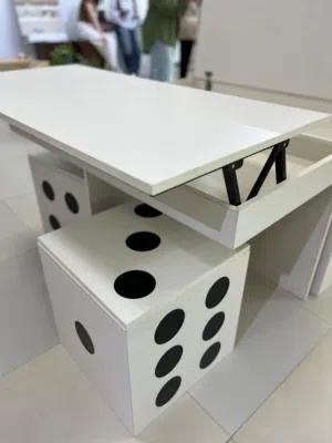 Living room (gaming table ) have a huge storage and the chairs have storage aslo