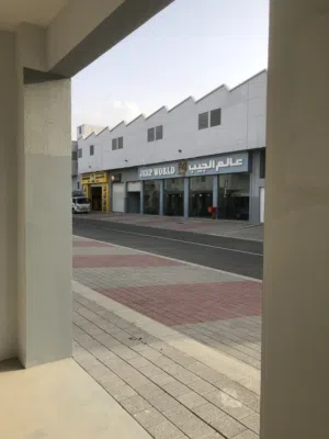 محل تجاري/صناعي بدخل شهري للبيع في مشروع مدينة سندان الصناعية