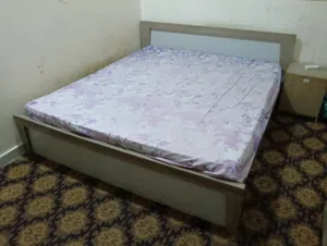4-door wardrobe, beige color, with a bed (mattress not included), size 1.8*1.8 meter
