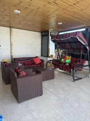 مرجيحه و طقم راتان