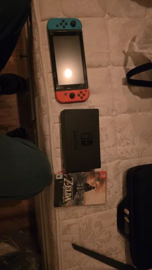 nintendo switch neon version barley used LCD screen and in good condition