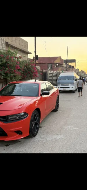 جارجر sxr لون مميز برتقالي حادثع جاملغ وباب سايق وباب خلفي صبغ سياره ماشيع 86 رقم بغداد باسمي سياره