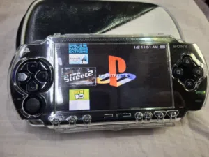 PSP P1003 MODEL.CLEAR CASE COVER BLACK COLOR 4GB SD CARD 35=GAMES AVAILABLE