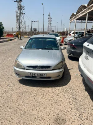 كيا ريو  موديل 2000  كير عادي  رقم بغداد شرط التحويل  مكينه وكير خير من الله