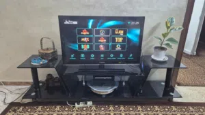 طاولة تلفزيون زجاج لون أسود