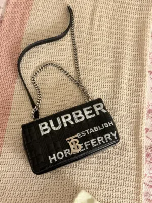 Authentic Burberry mini silver bag
