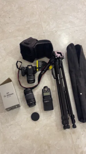 كانون D600 + فلاش + عدسة اضافيه 75-300 + ستاند