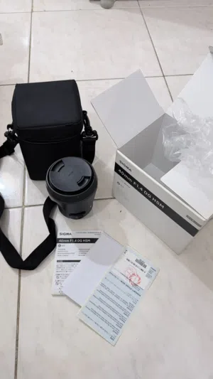 عدسة سيجما 40 mm فتحت عدسة 1.2 art لكاميرات dslr