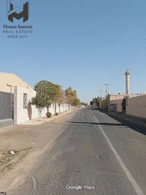 ارض صناعية للبيع في طريق المطار القسطل / قرب مصانع عابدين(القسطل)