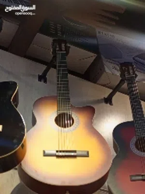 موسيقى تعليم الات وترية كمان جيتار عود سمسمية اورغ   طبلت طبول جيتار كلاسك احترافي Ross