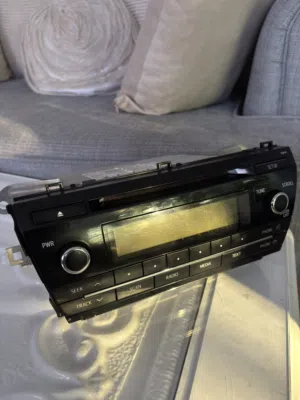 Used 2014 Toyota Corolla OEM Radio + Original Dash Trim