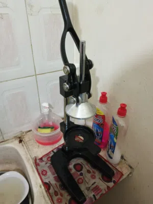 عصاره البرتقال الضغط