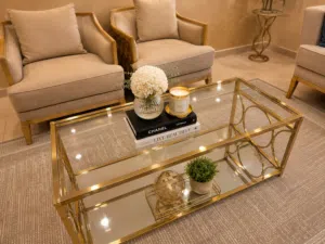 L-Shaped Orange Sofa + Gold Glass Coffee Table