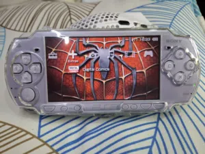 PSP SONY P2000 MODEL PSP SLIM.4GB SONY SD CARD WITH 17GAMES AVAILABLE