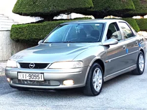 اوبل فيكترا اوتوماتيك موديل 1999 دهان جديد قبل اسبوع محرك 1600cc توب نظافة