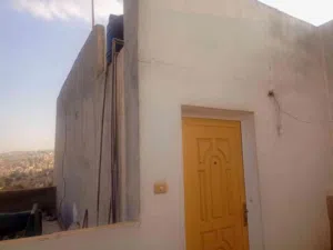 عمارة سكنية في الهاشمي الشمالي